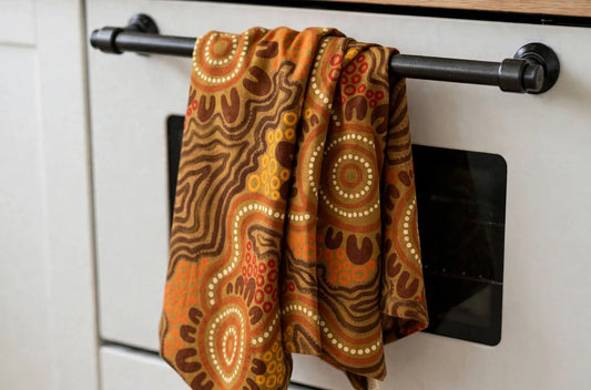 Rhythms of the Earth Tea Towel | Ochre Earth Igbo Kitchen Towel